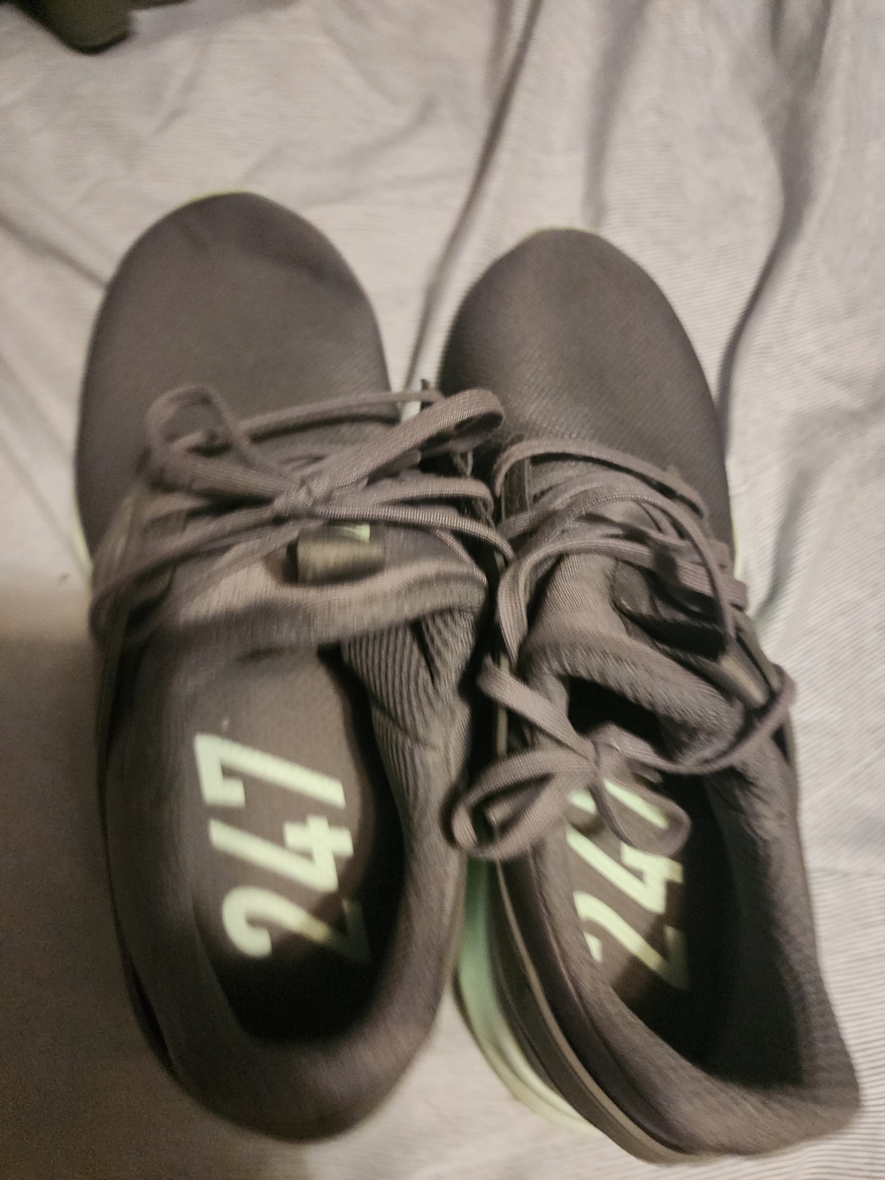 New Balance Women's Athletic Sneakers in Dark Gray with Mint Accent